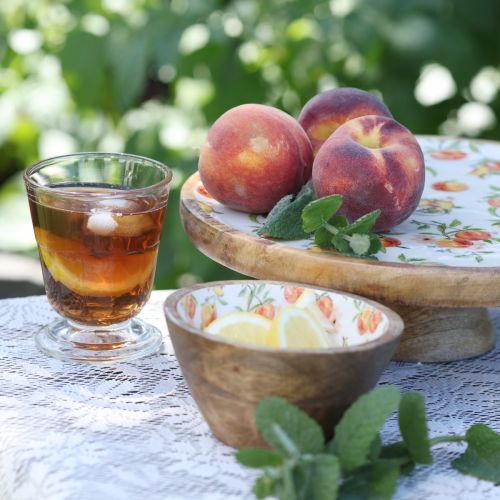 Artikel Deko Teller mit Fuß Mangoholz Pfirsich Motiv Ø26cm H9,5cm